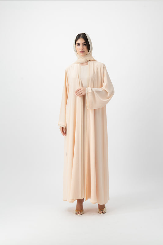 Crepe Crochet Trim abaya in Peach Dust by GREI