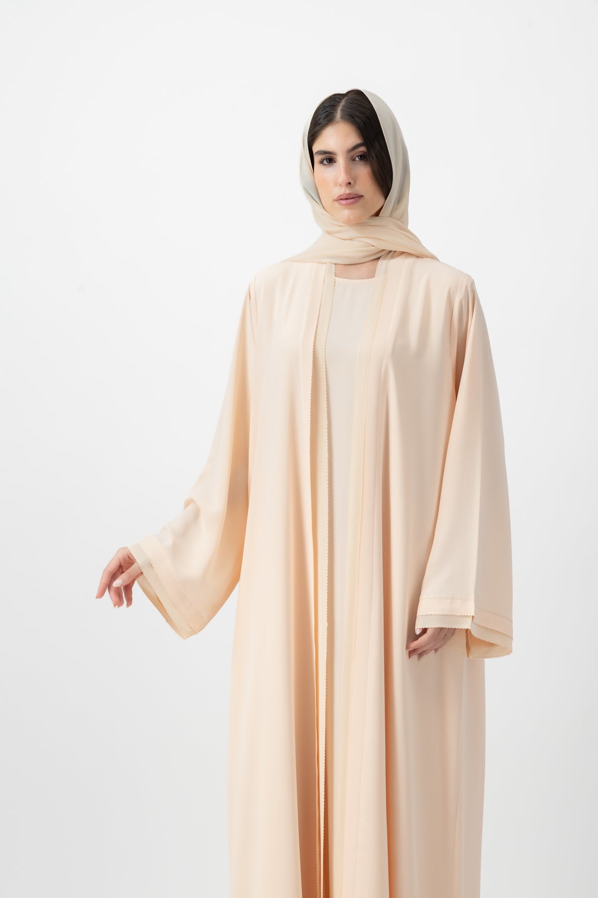 Crepe Crochet Trim abaya in Peach Dust by GREI